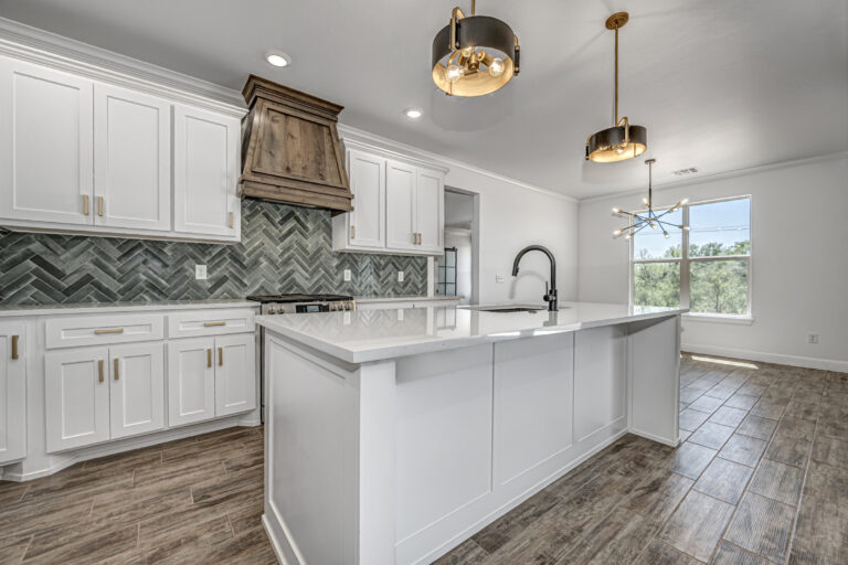 new construction kitchen with green tile accents