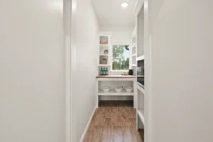 Walk-in hidden pantry with window