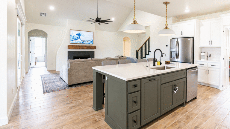 Twin brass pendants over sage island